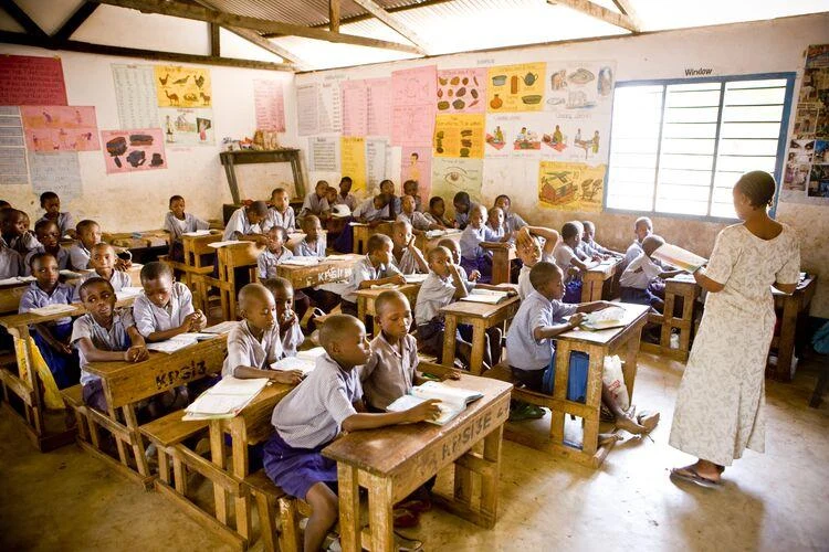 Children learning at their desks in a classroom